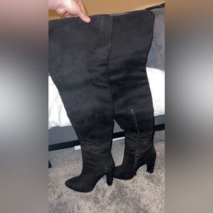 Thigh high heeled boots